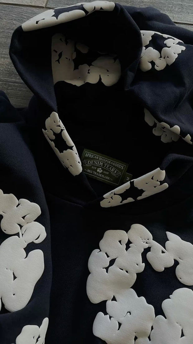 <h2>DENIM TEARS</h2>