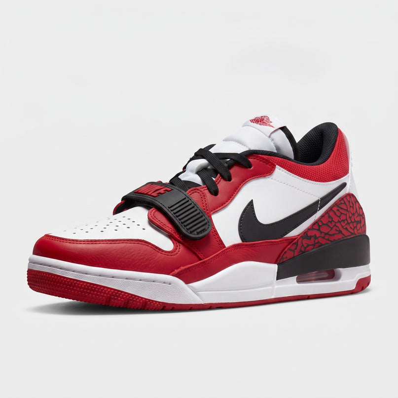 Jordan Legacy 312 Low Chicago Red — 3/4 studio angle
