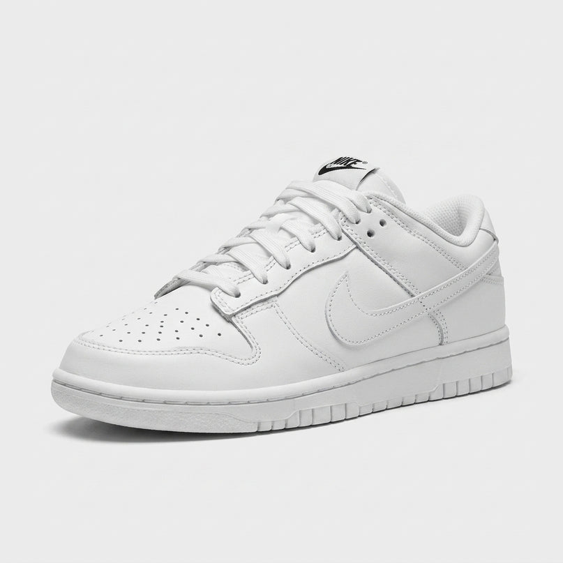 dunk low triple white — 3/4 studio angle
