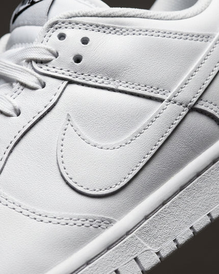 dunk low triple white — Premium detail close-up