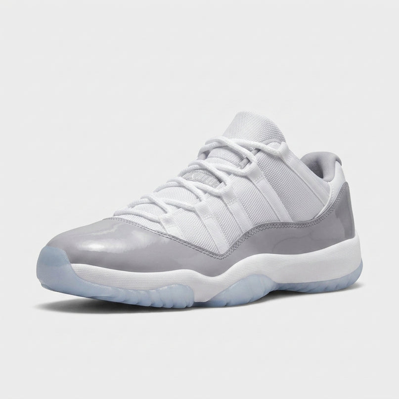 Jordan 11 Retro Low Cement Grey — 3/4 studio angle