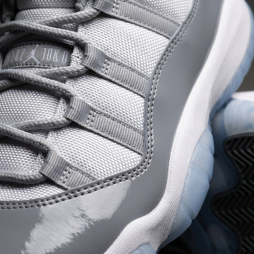 Jordan 11 Retro Low Cement Grey — Premium detail close-up