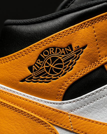 jordan 1 mid university gold — Premium detail close-up