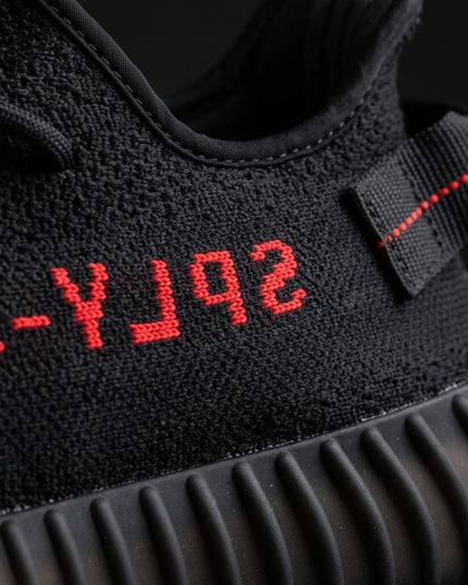 Yeezy 350 Core black — Premium detail close-up