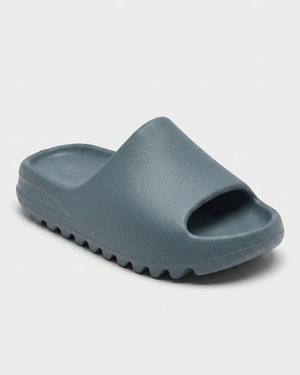 Yeezy Slide Slate Marine Kids — 3/4 studio angle